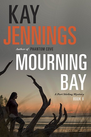 Mourning Bay cover w/woman leaning against driftwood at sunset