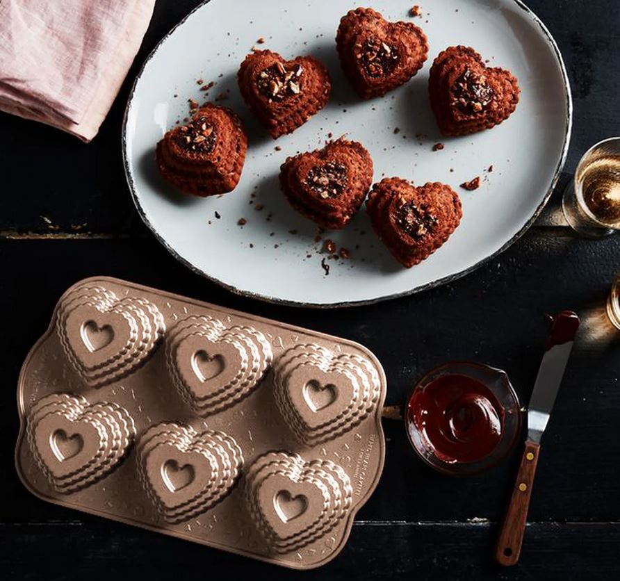 Cakelet pan with 6 tiered heart molds.