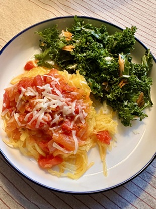 Pic of Spaghetti Squash Marinara and Kale Salad on white dish