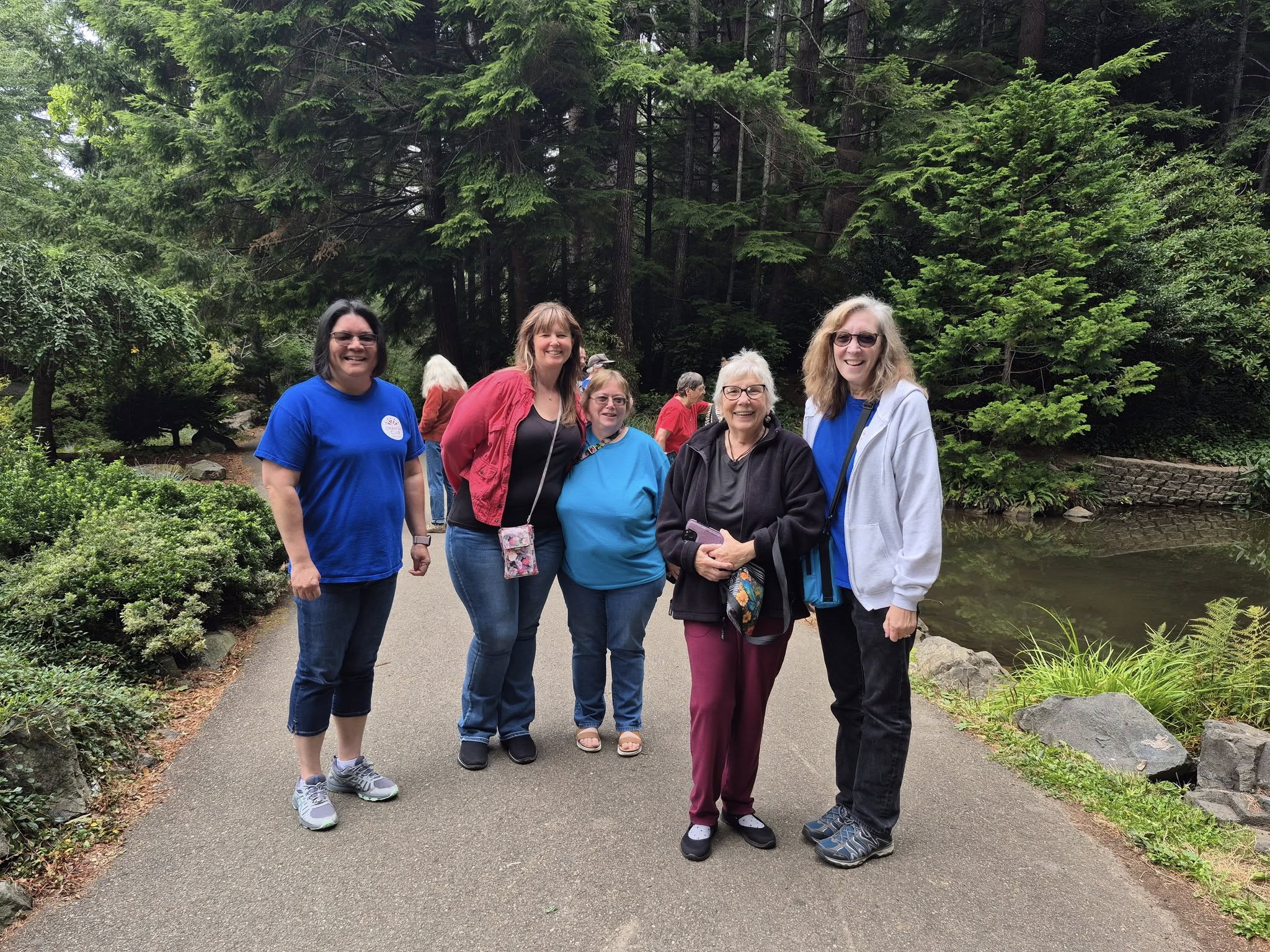 Pic of Sole Mates on path by pond at Mingus