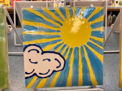 Sunshine and cloud painting on display at the library