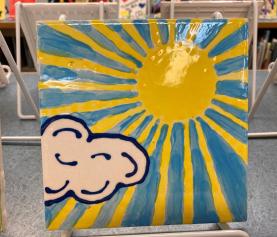 Sunshine and cloud painting on display at the library