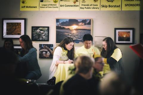 spelling bee team sitting at a table