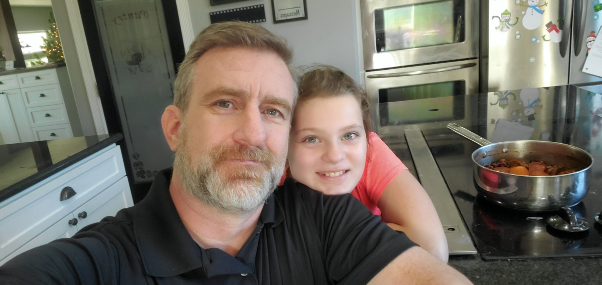 Pic of Sam and Alex in their kitchen