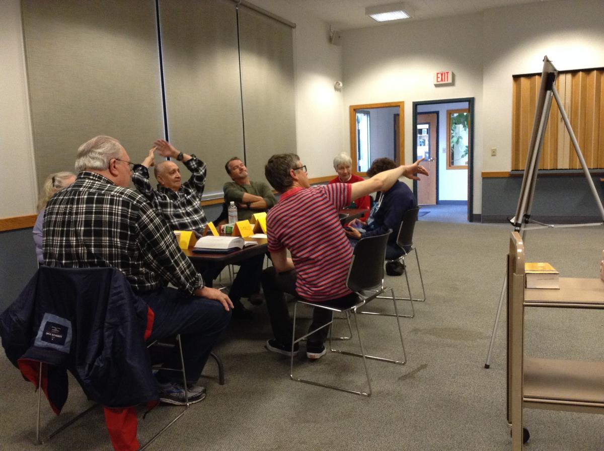 Pic of group talking in Spanish